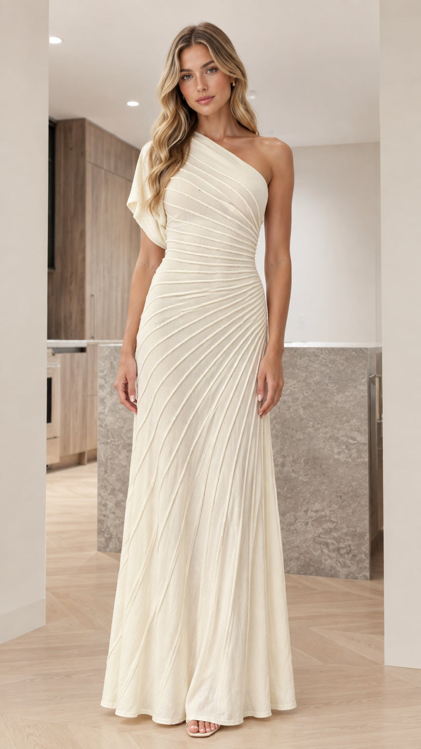 Front view of woman wearing ivory one-shoulder pleated maxi evening gown