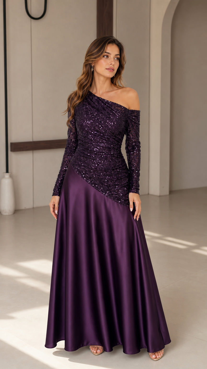 Front view of model wearing deep purple one-shoulder sequin and satin maxi gown