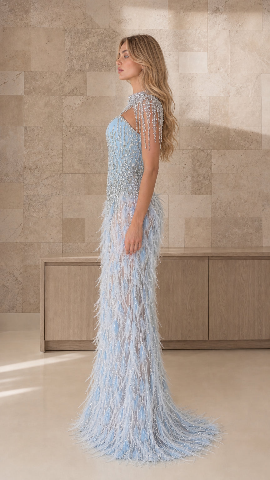 Side profile view of light blue feathered formal dress