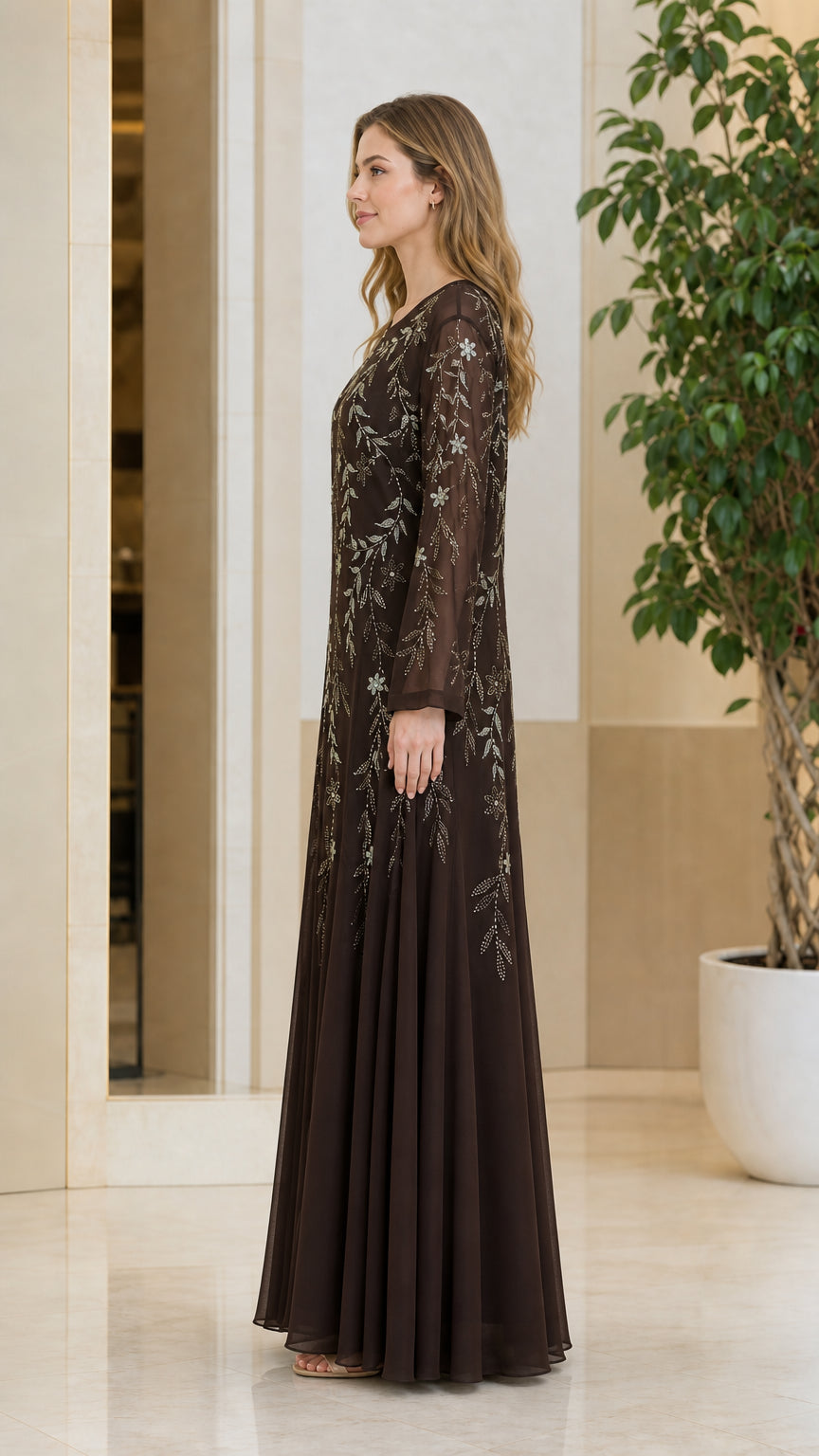 Side profile view of model wearing the Coffee brown long sleeve maxi dress