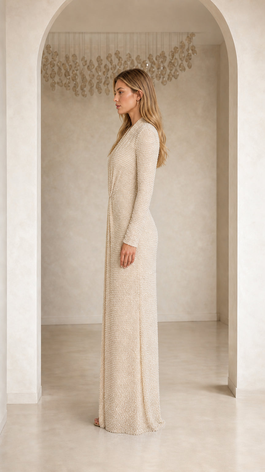 Side profile view of model in Champagne maxi dress