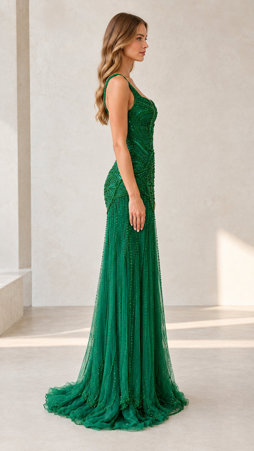 Emerald green beaded formal gown side profile view