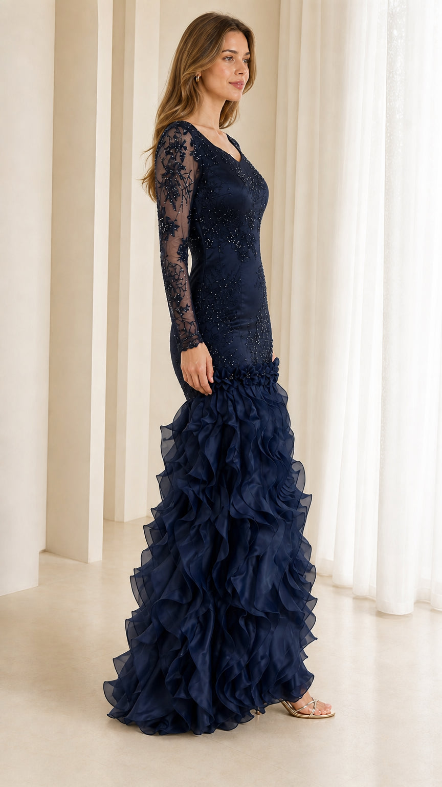 Navy blue formal evening dress with sheer lace sleeves side angle view