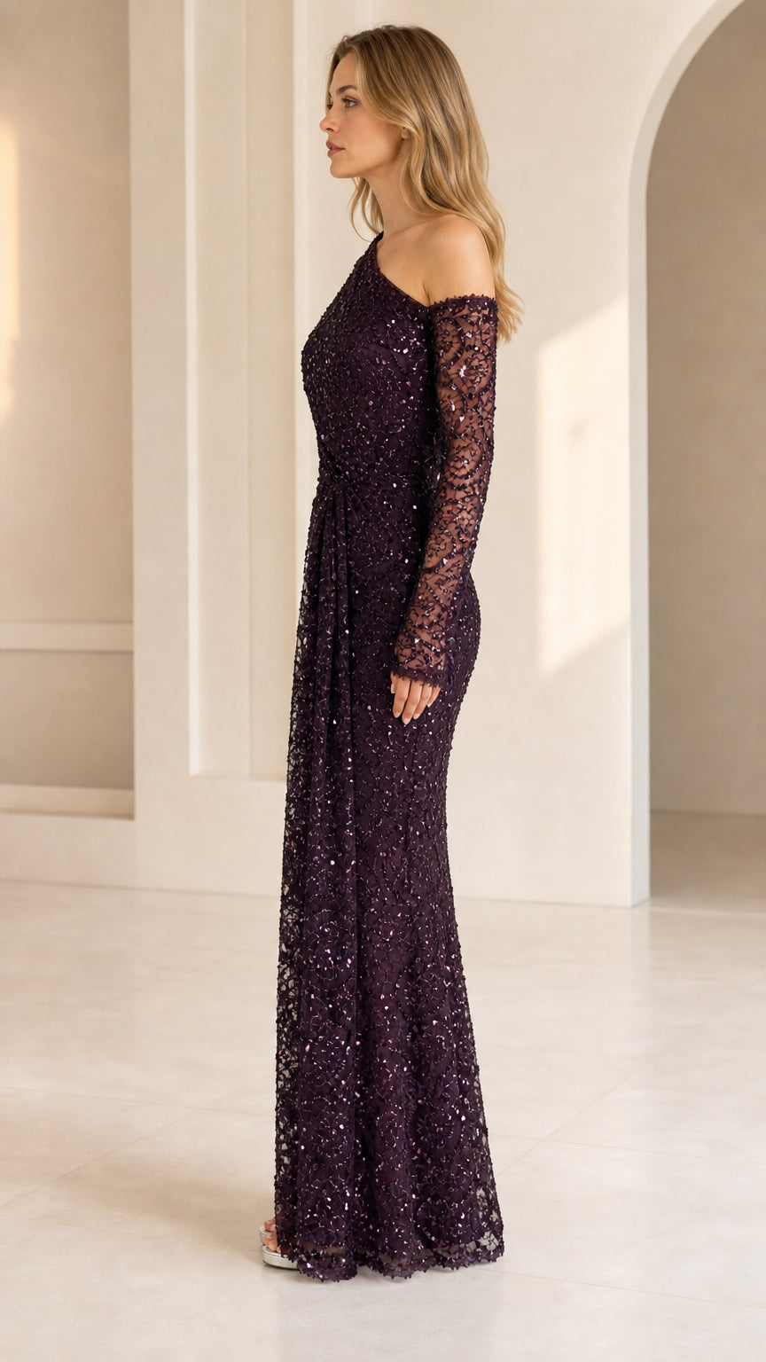 Side view of woman in plum sequined long sleeve maxi dress
