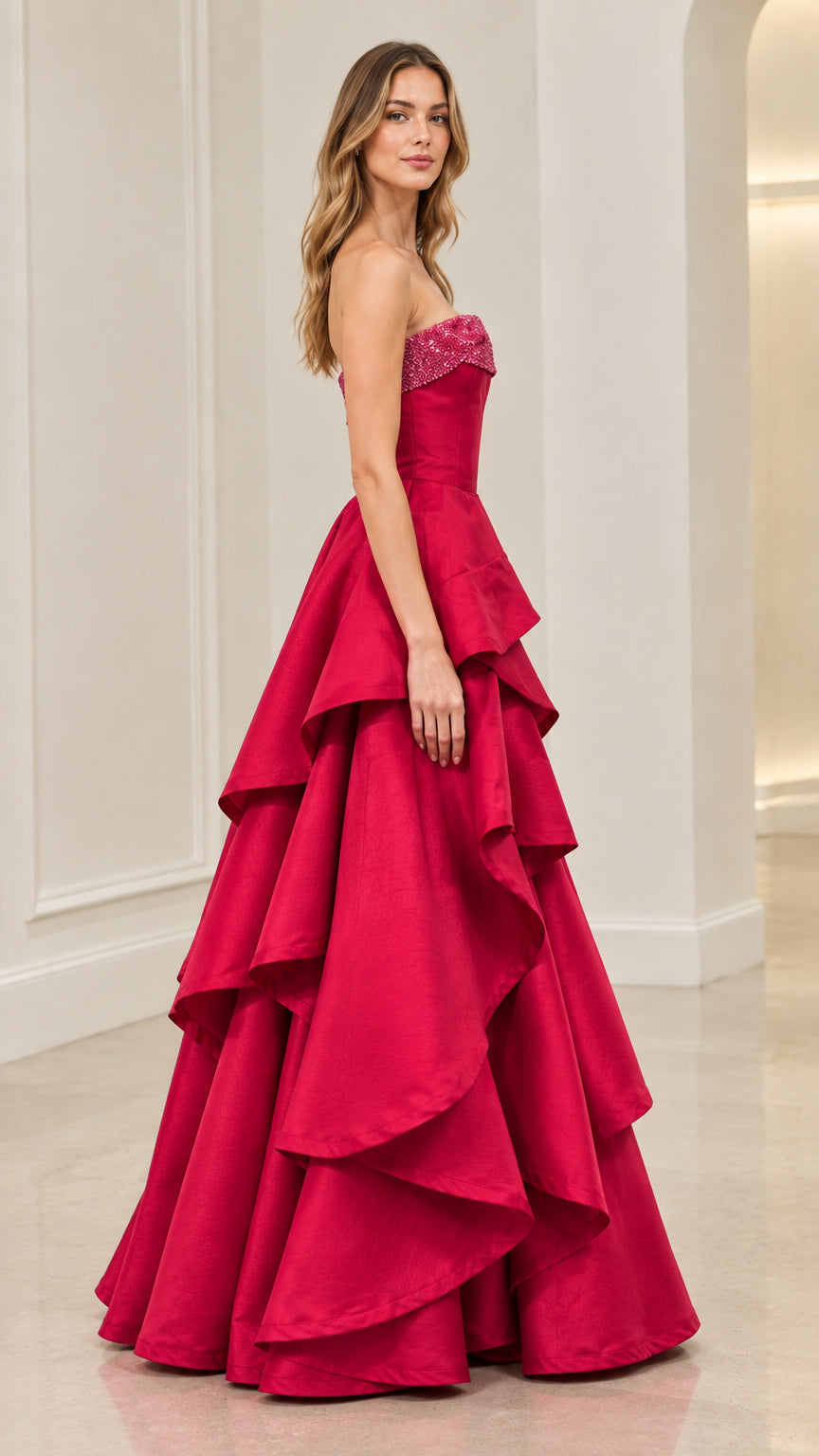 Side profile of Fuchsia strapless high-low tiered formal evening gown