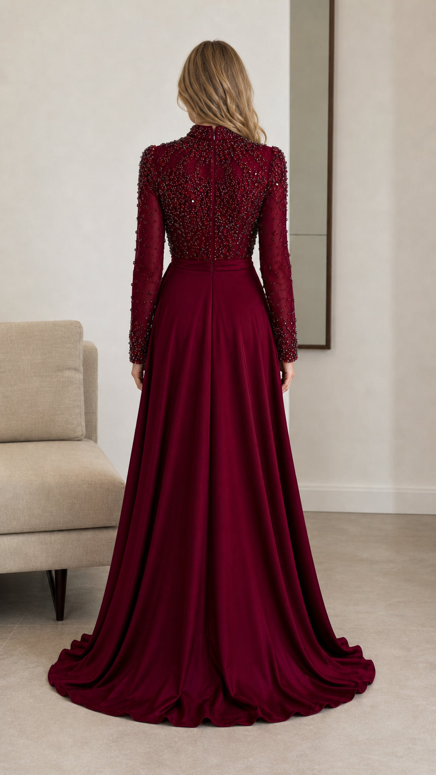 Back view of burgundy high neck evening gown showing elegant back silhouette and skirt drape
