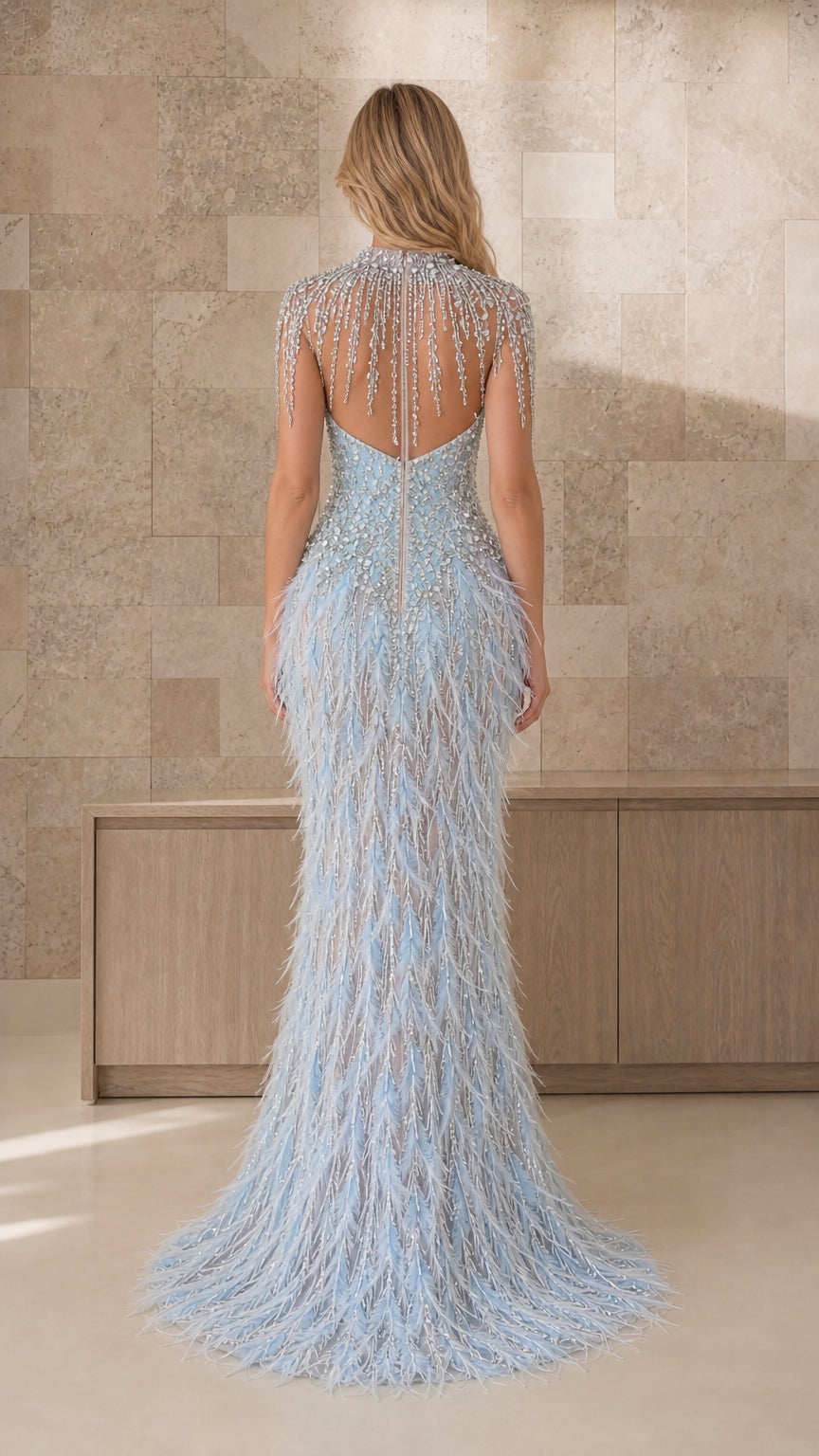 Back view showing crystal back detailing on light blue gown