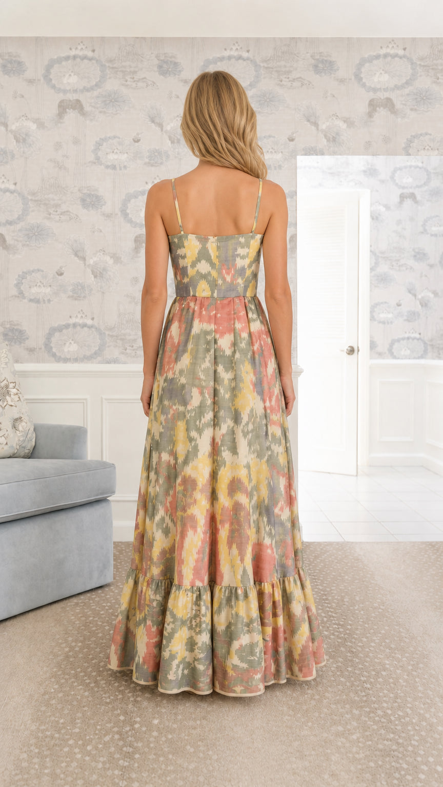 Back view of model in Sage Multi spaghetti strap maxi dress with tiered hem