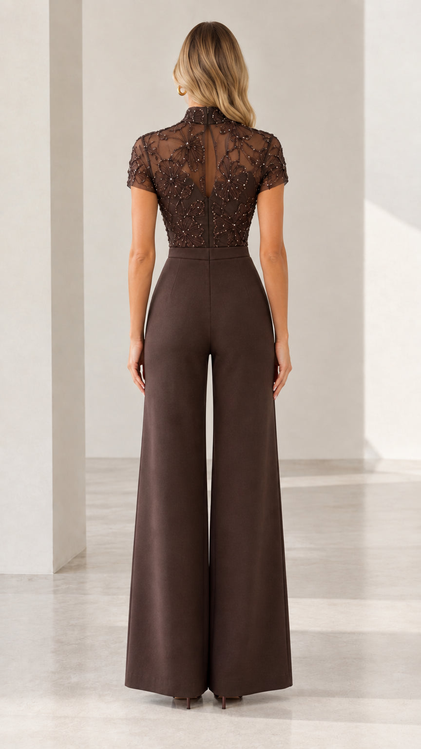 Back view of chocolate brown sheer back embroidered evening jumpsuit