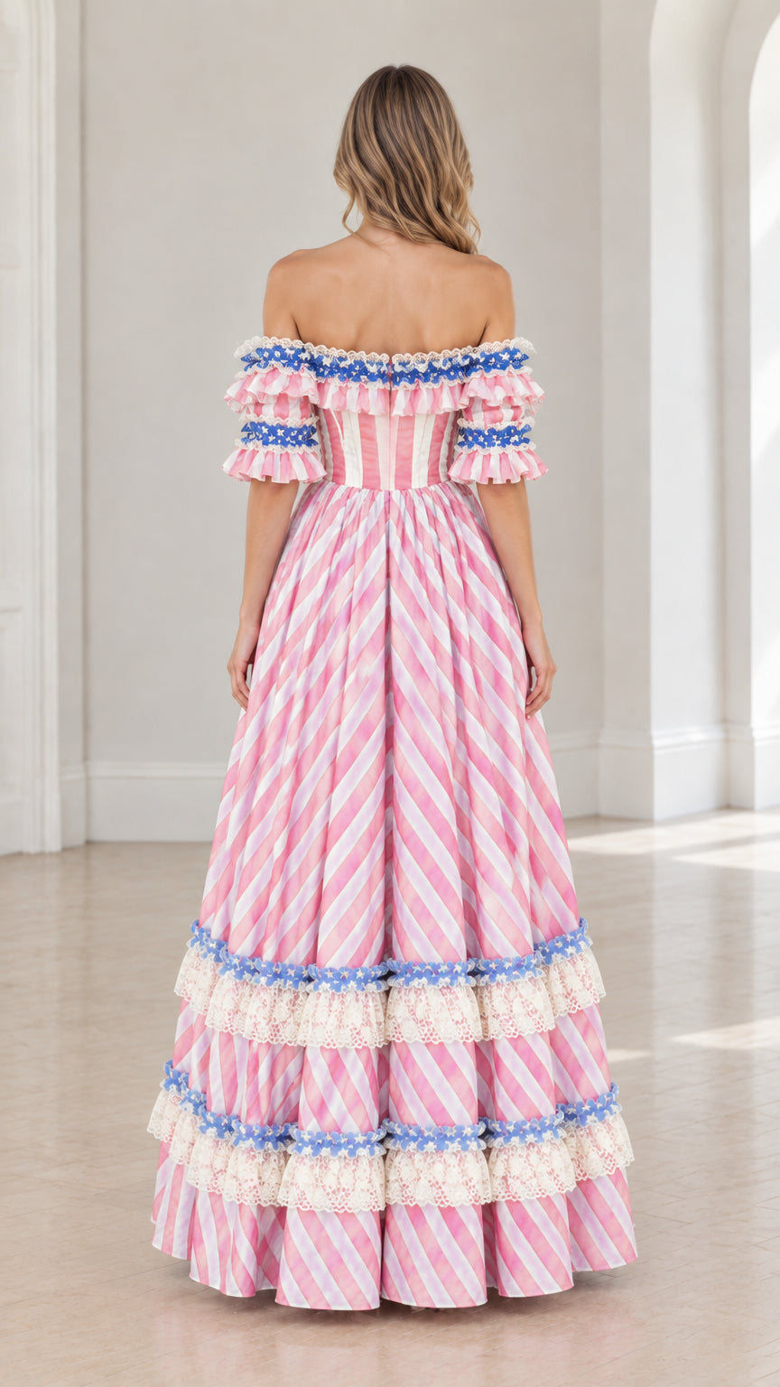 Back view of model in striped tiered Victorian ball gown dress