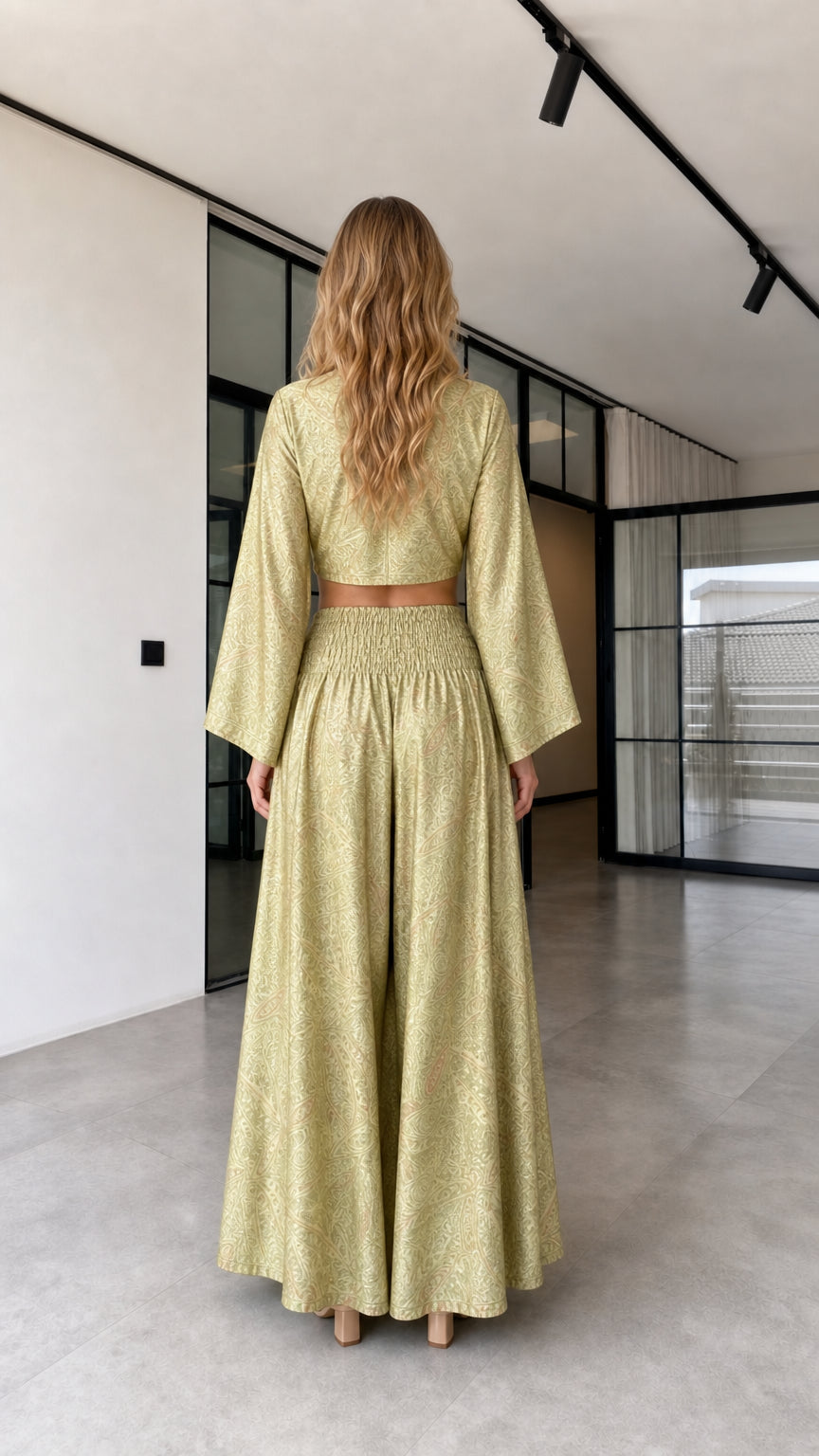 Back view of the olive gold long-sleeve crop top and wide-leg pants set