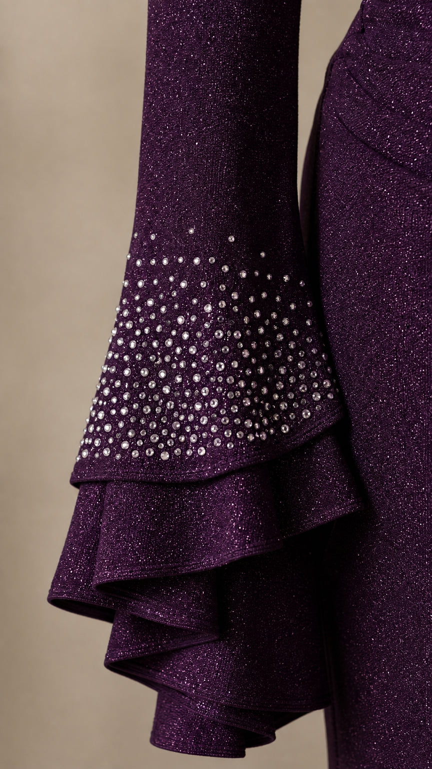 Detailed close-up of multi-tiered ruffle sleeve cuff with scattered rhinestone embellishments