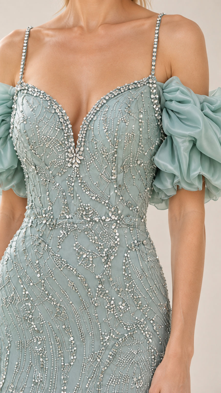 Close-up detail of sparkling beaded bodice and sweetheart neckline with straps