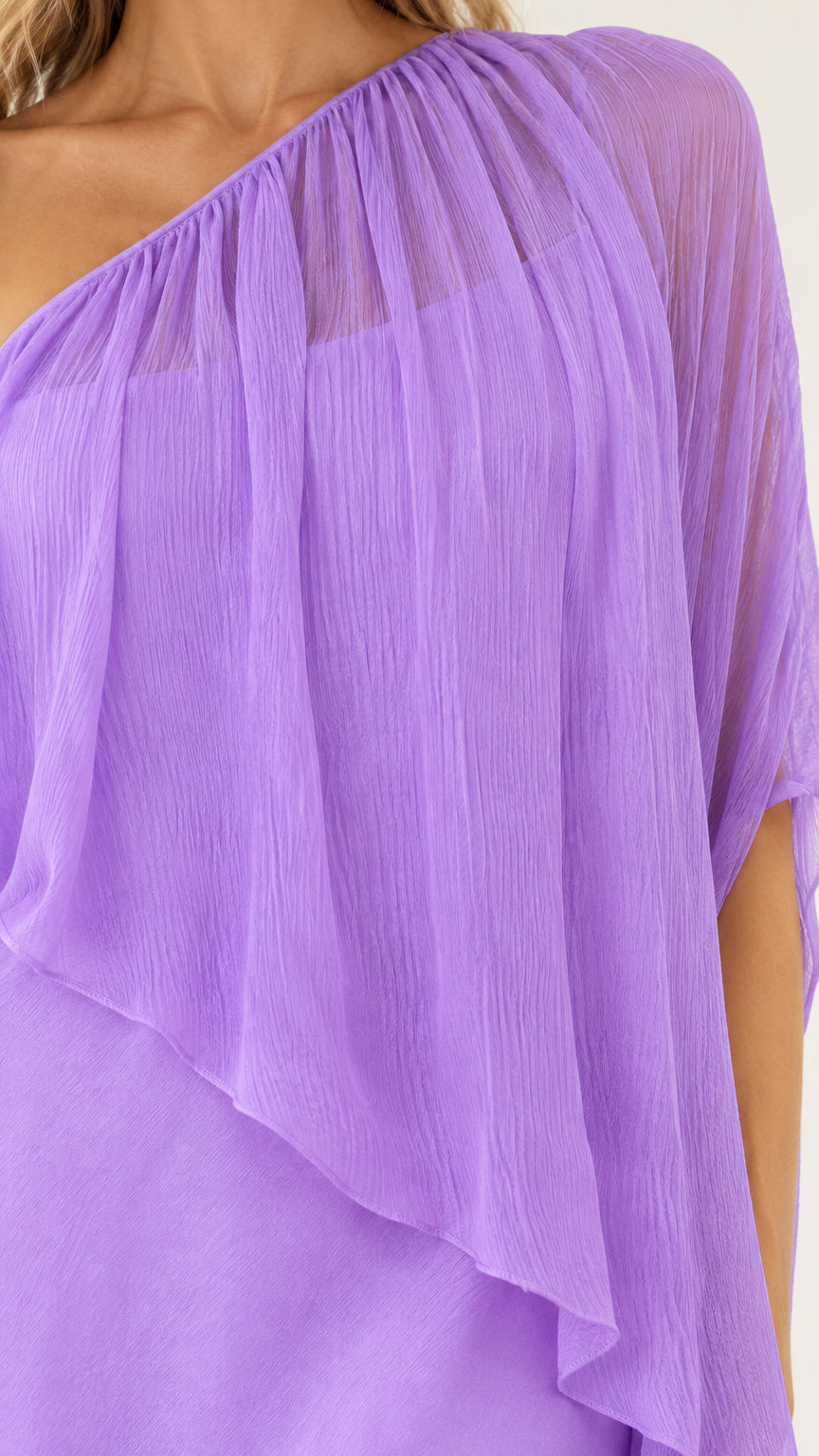 Close-up detail of pleated sheer lavender chiffon cape shoulder