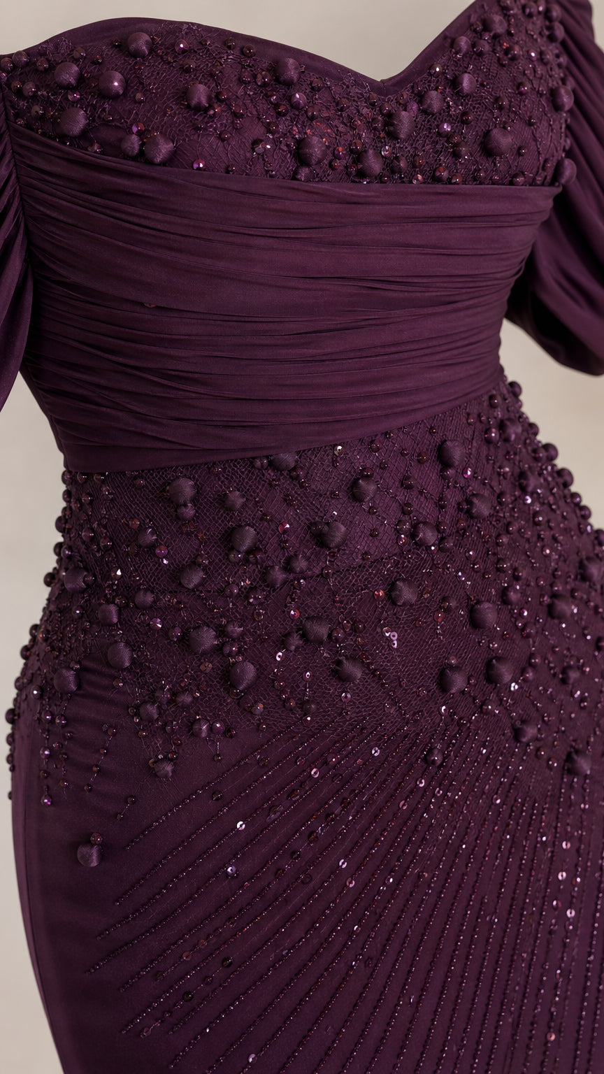 Close-up detail of the ruched sweetheart bodice with intricate tonal beading and sequins