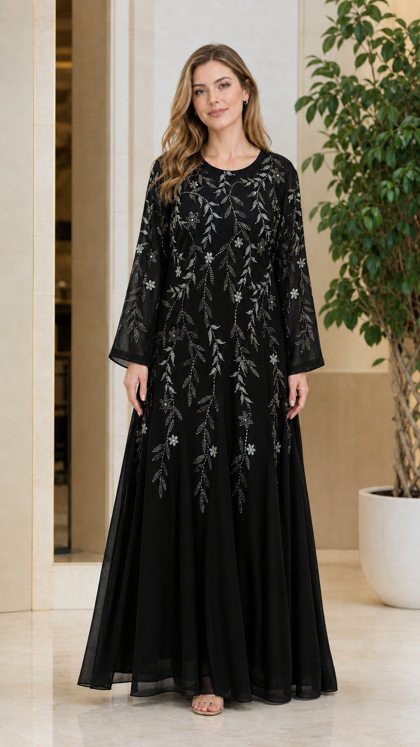 Front full-length view of model wearing the Black rhinestone embellished maxi dress