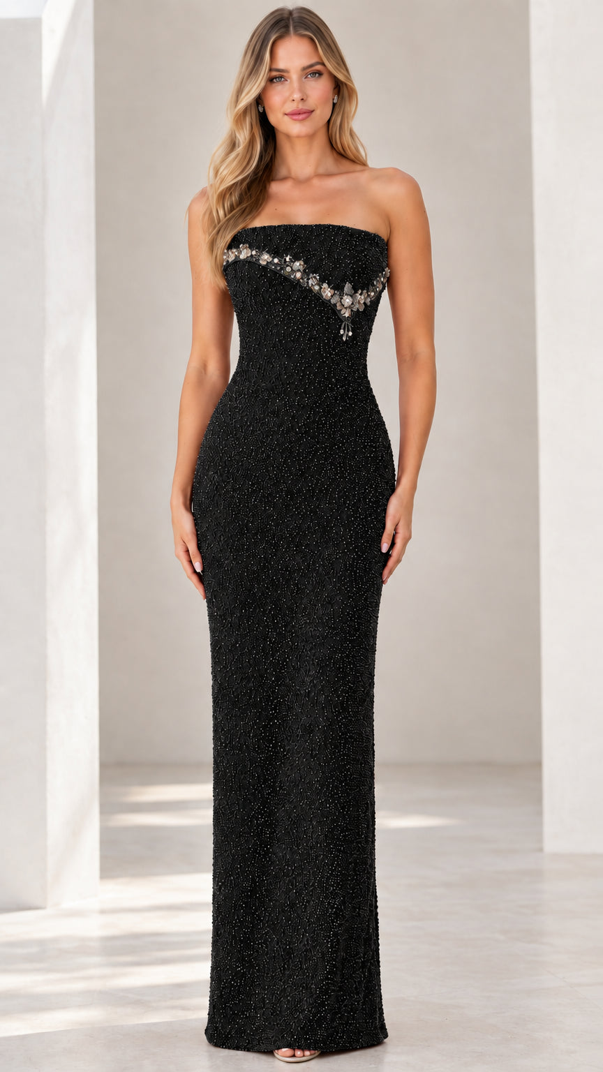Front view of black strapless beaded column evening gown