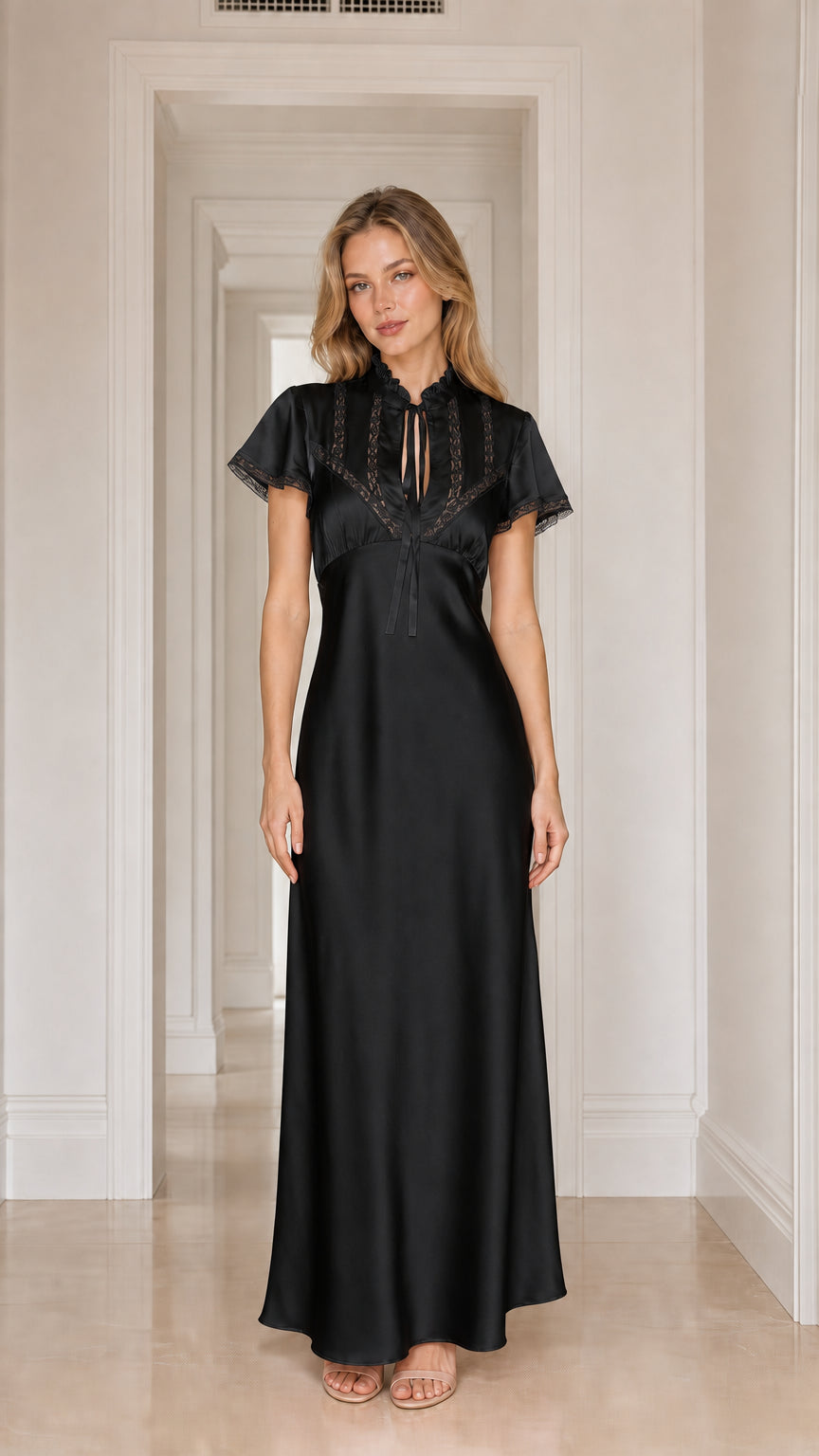 Model wearing black satin lace-trim maxi dress
