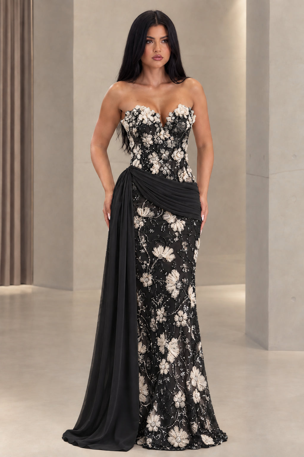 Black strapless floral embroidered mermaid gown with flowing side sash