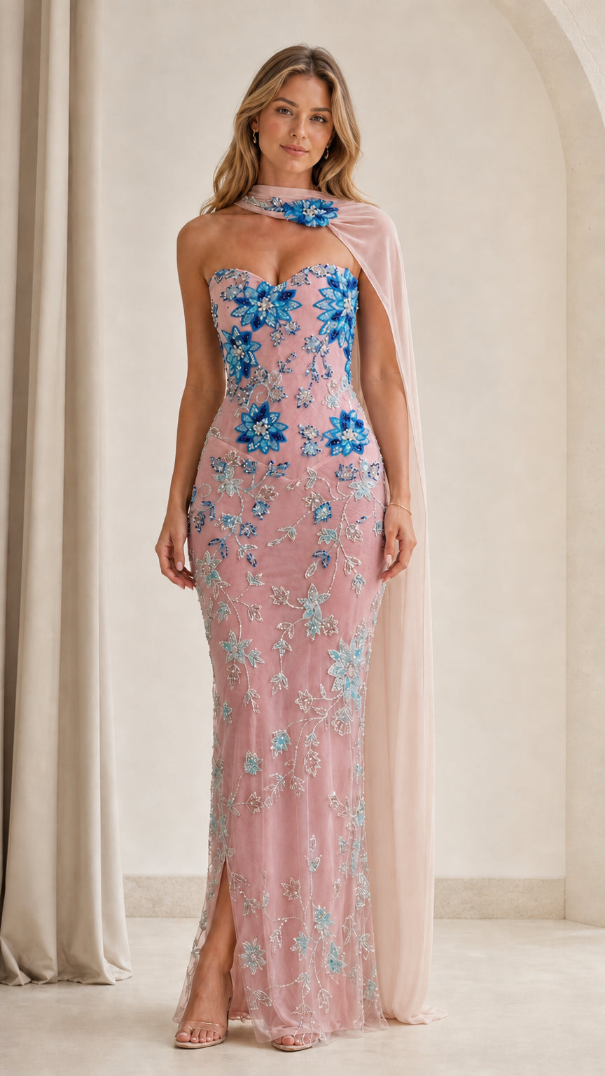 Model wearing blush pink floral sequin embellished strapless gown