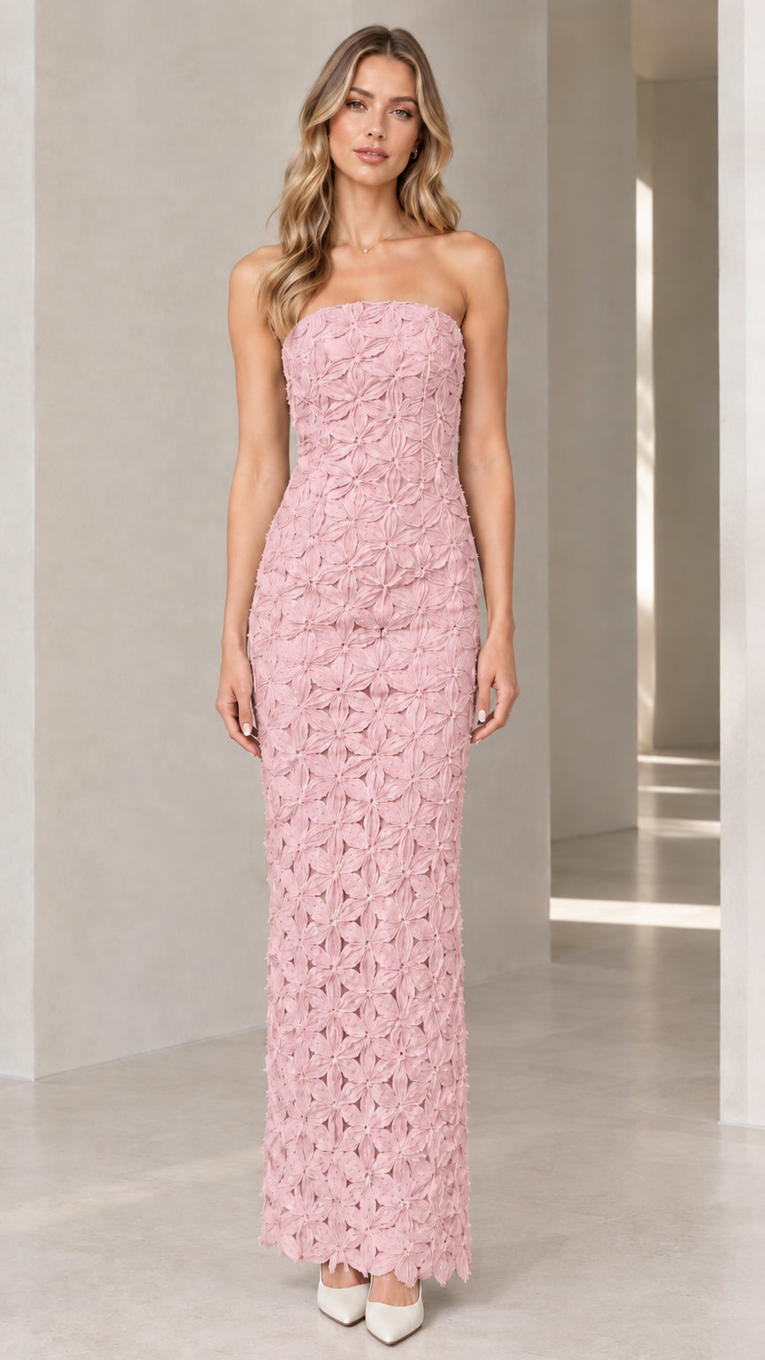 Full-length front view of blush pink strapless 3D floral maxi gown