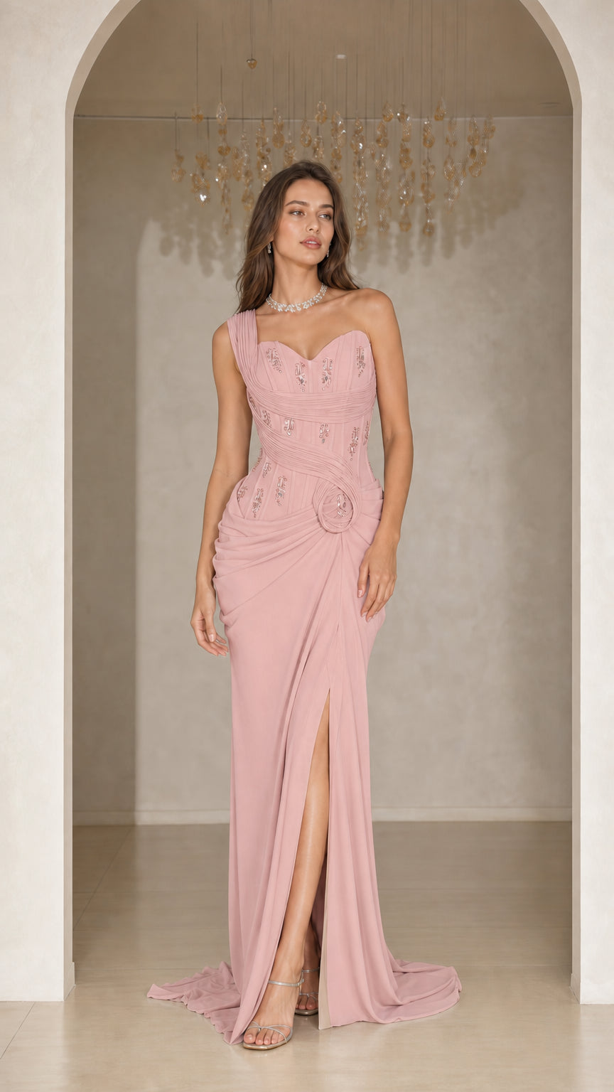 Woman wearing dusty pink one-shoulder ruched maxi formal gown