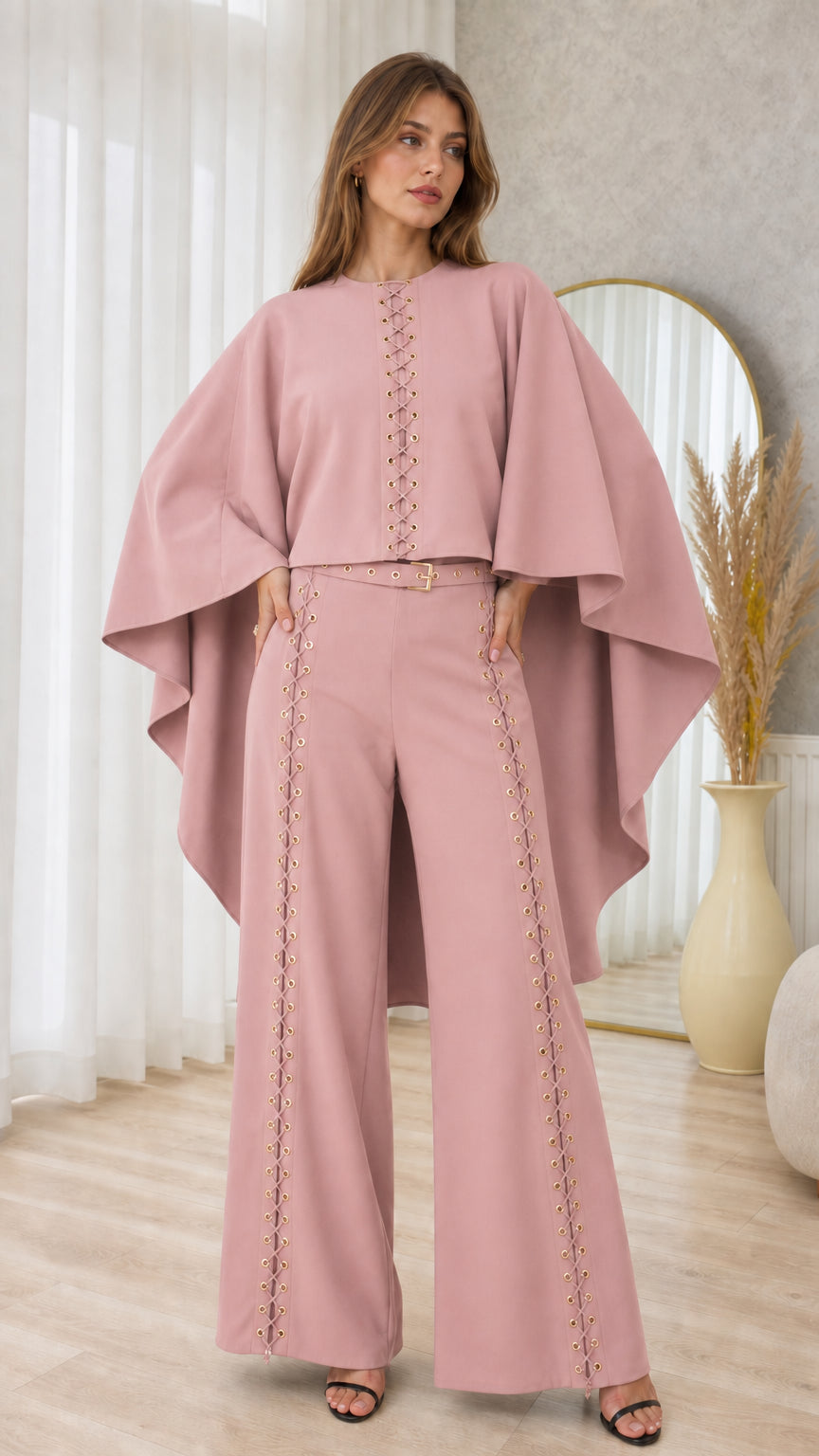Front full-length view of dusty pink cape top and lace-up wide-leg pants set