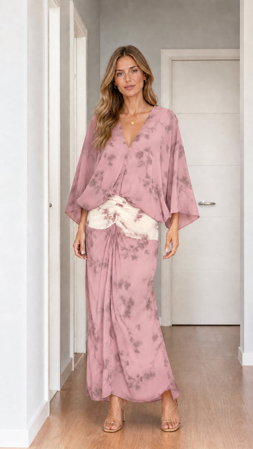 Model wearing pink tie-dye two-piece set
