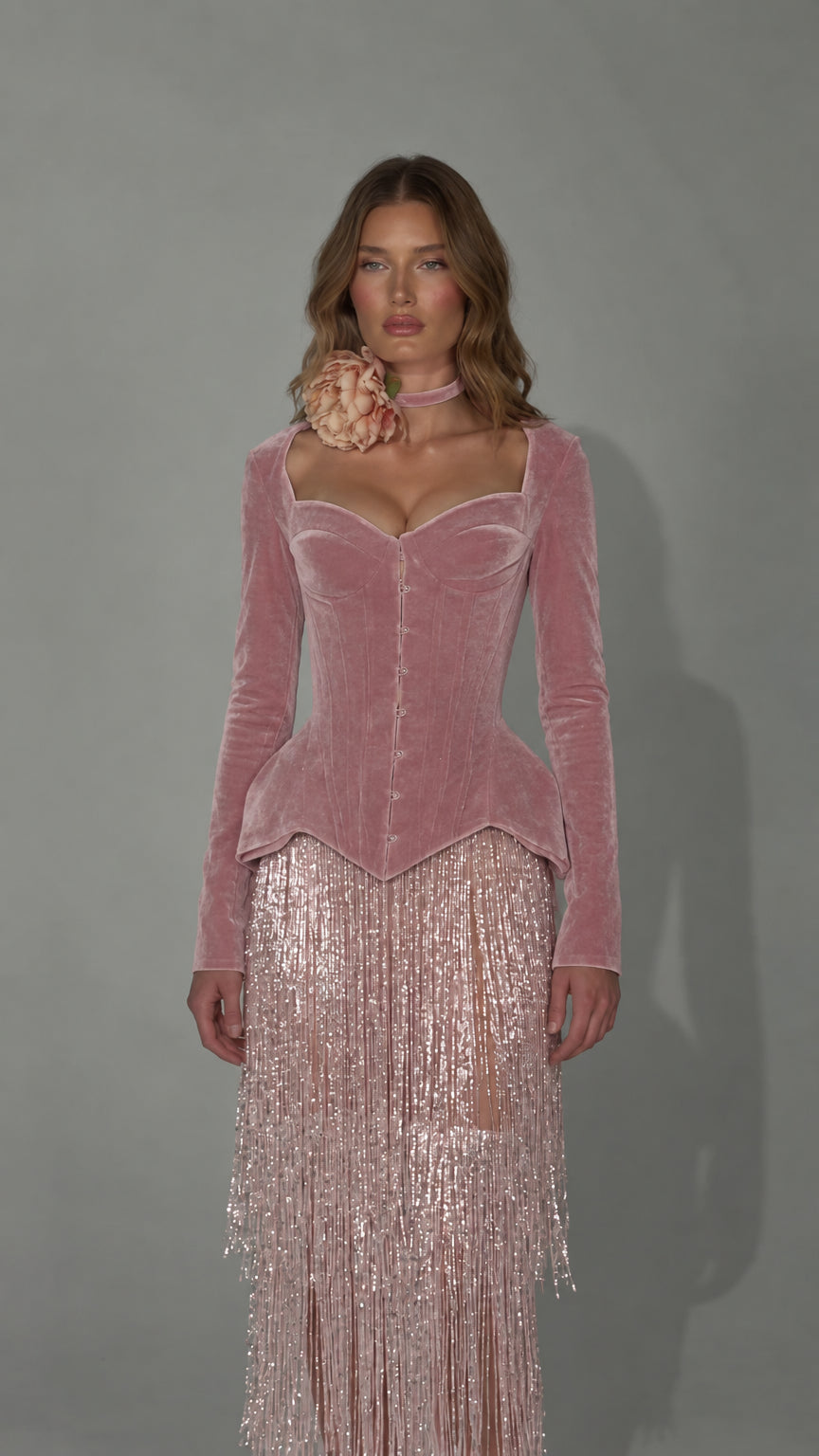 Front view of dusty pink velvet corset dress with matching sparkling fringe skirt