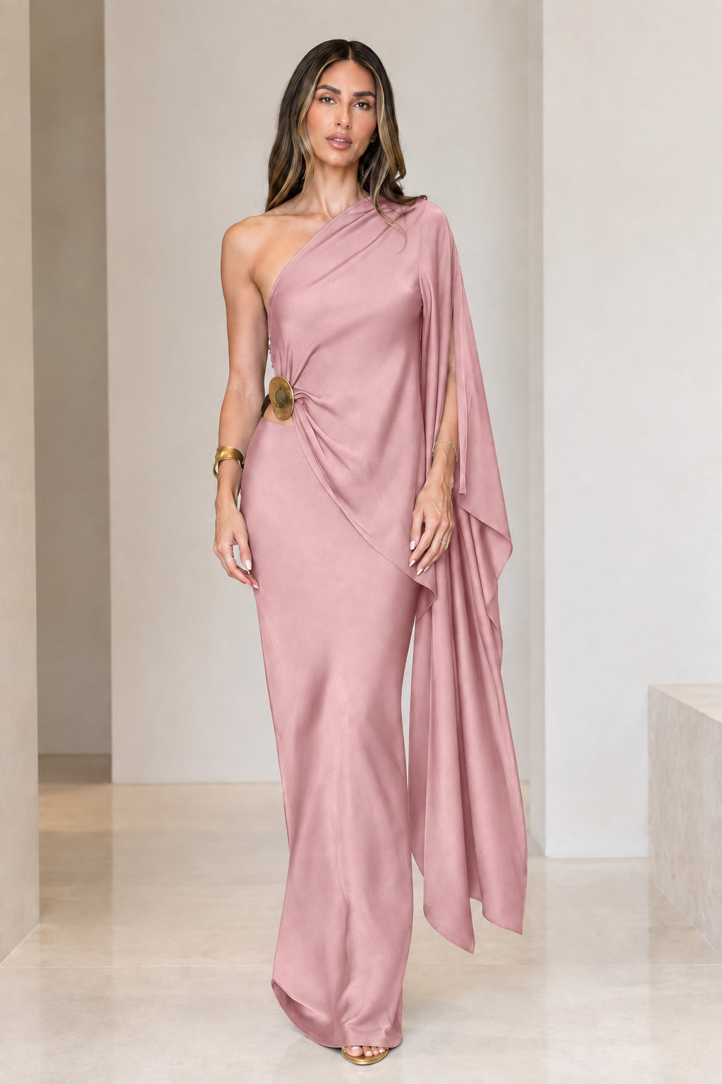 Front view of model wearing dusty rose pink one-shoulder draped satin maxi dress