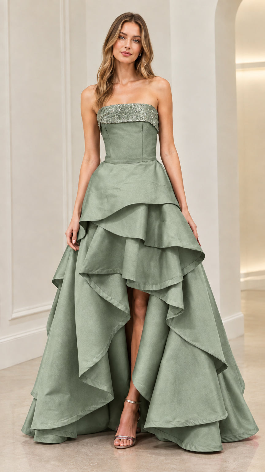 Front view of model wearing Sage Green strapless sequin-trim tiered high-low ball gown