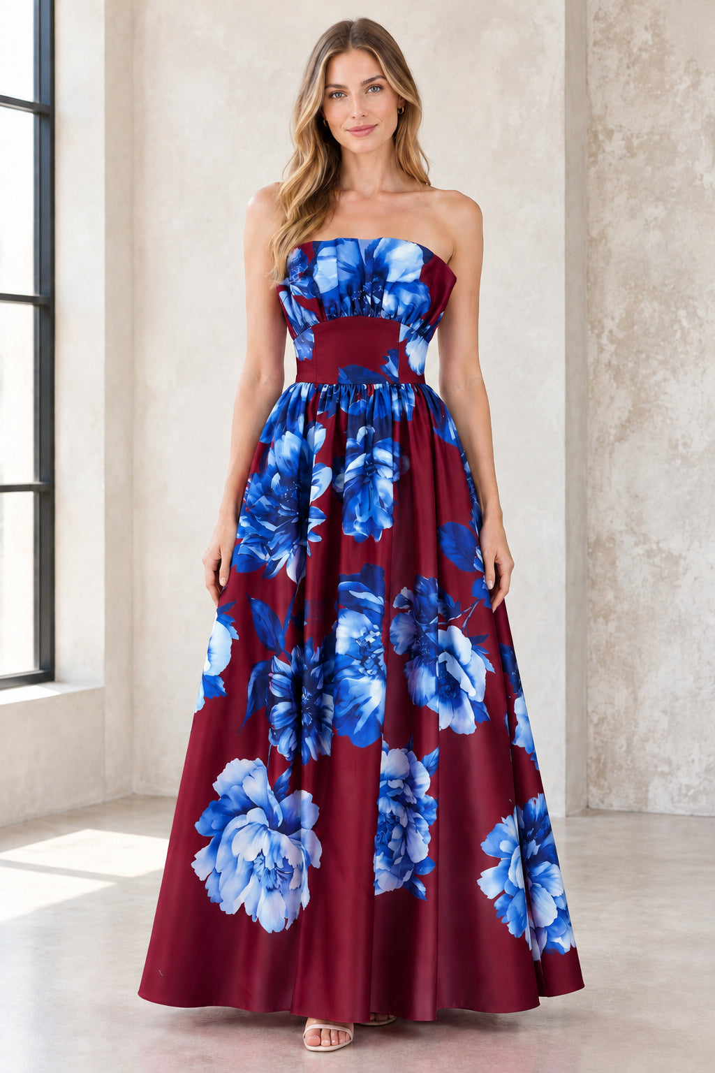 Full-length view of burgundy strapless floral satin formal maxi dress
