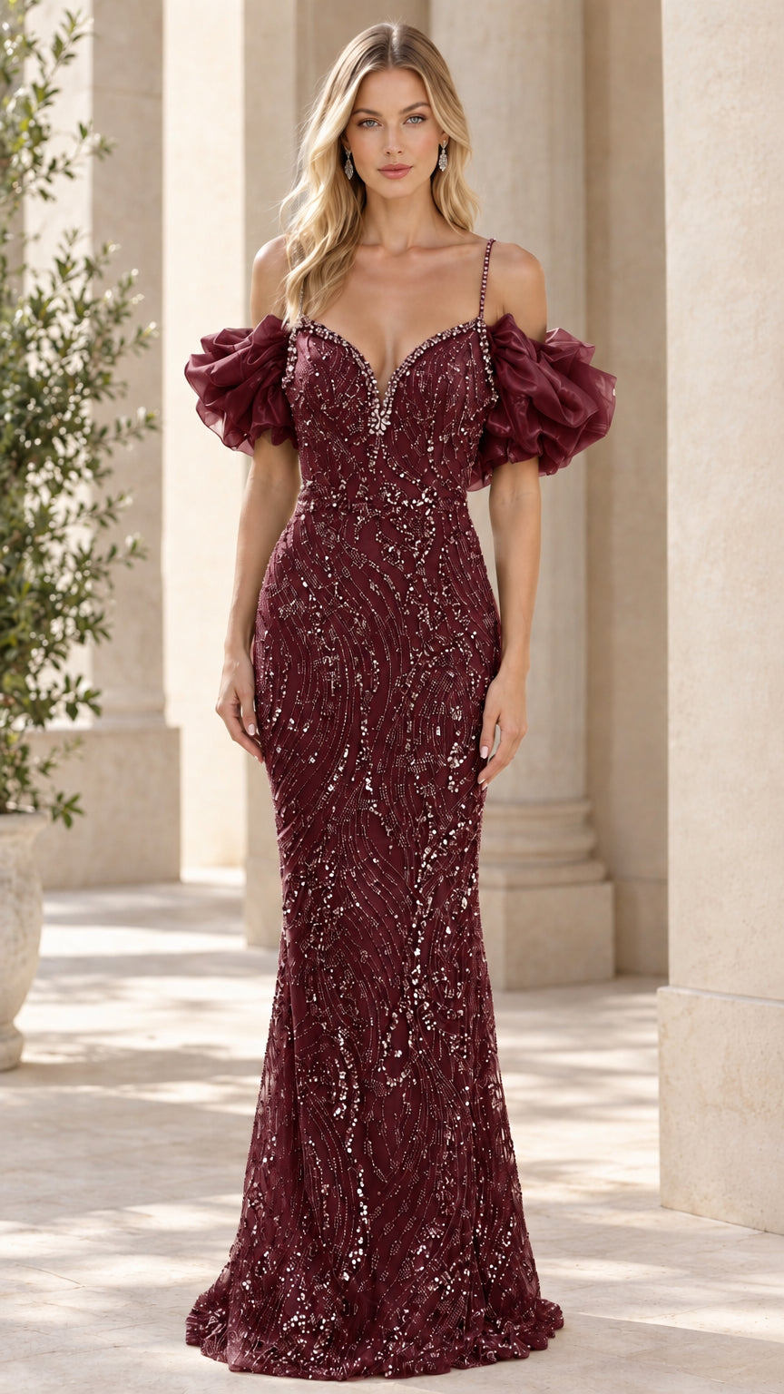 Front view of the burgundy wine beaded formal maxi dress with ruffled sleeves