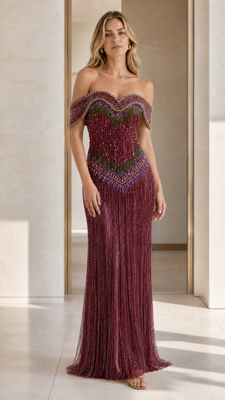 Model wearing burgundy color variant of the beaded evening gown