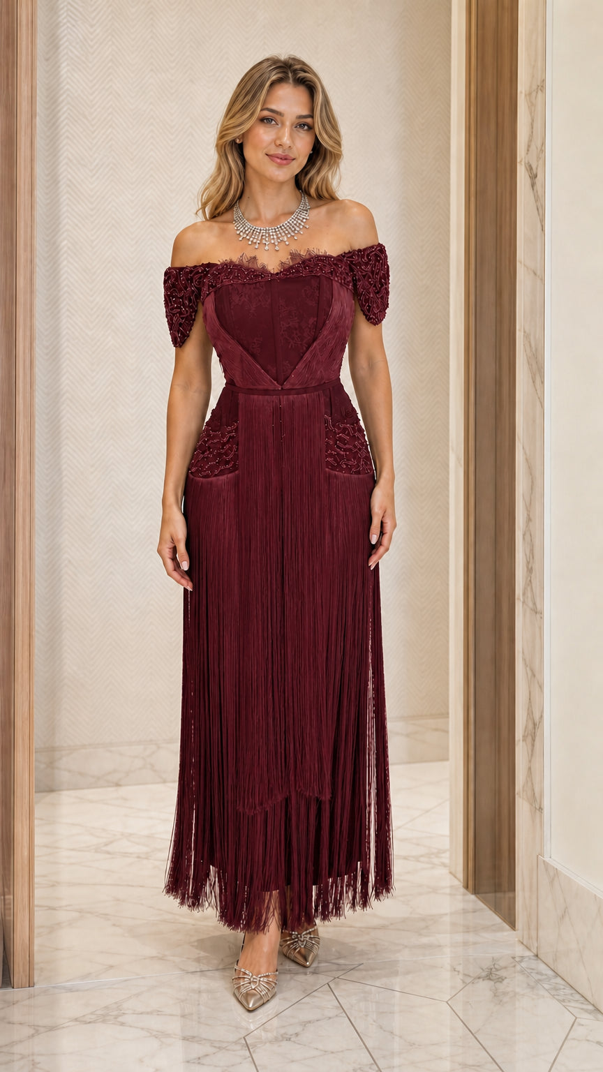 Front view of burgundy red off-the-shoulder beaded fringe maxi dress