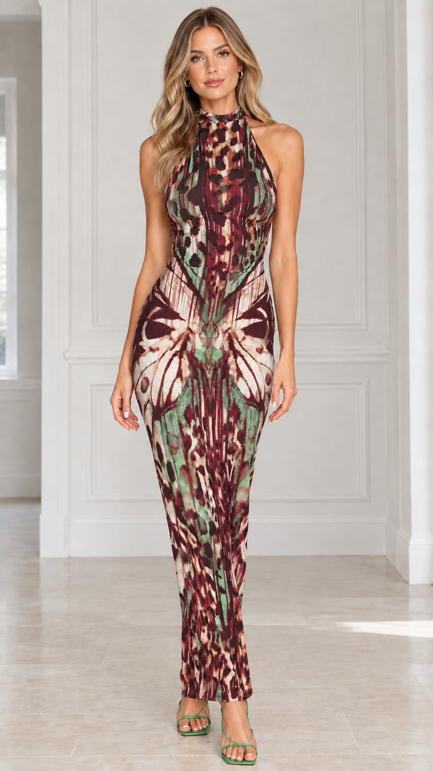 Front view of burgundy red butterfly animal print halter maxi dress