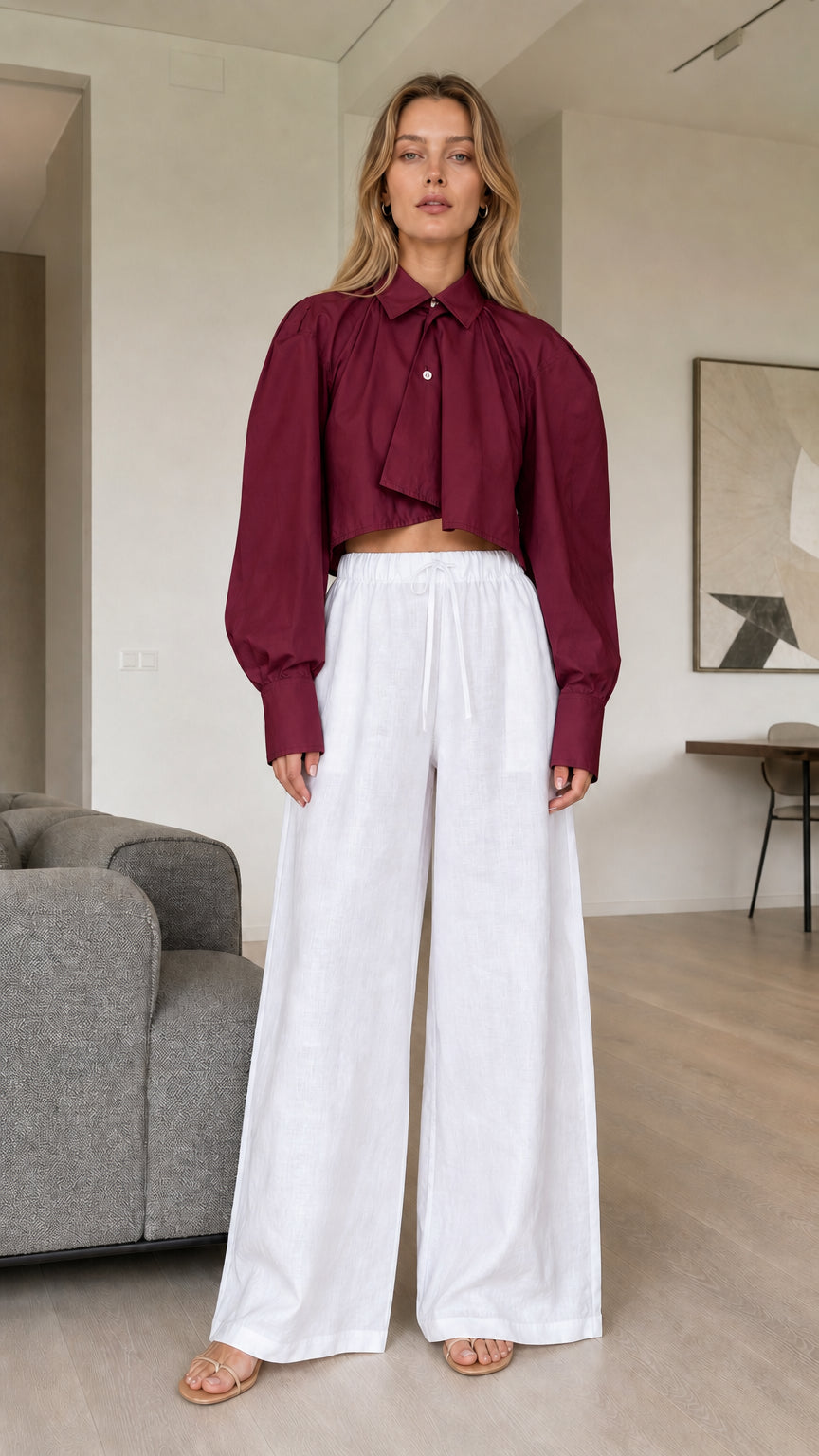 Model wearing burgundy wine cropped button-down top