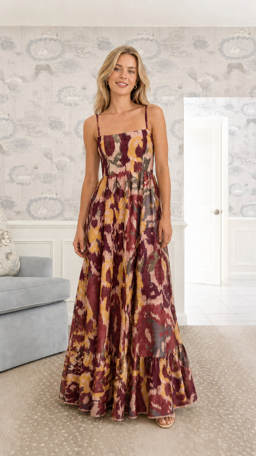 Model wearing Burgundy Multi ikat print spaghetti strap maxi dress