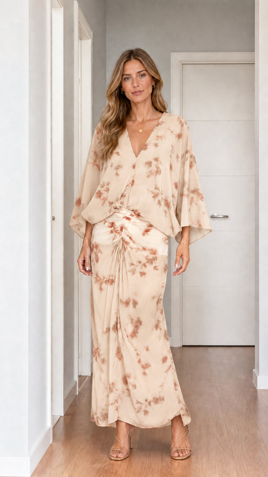 Model wearing beige tie-dye two-piece set