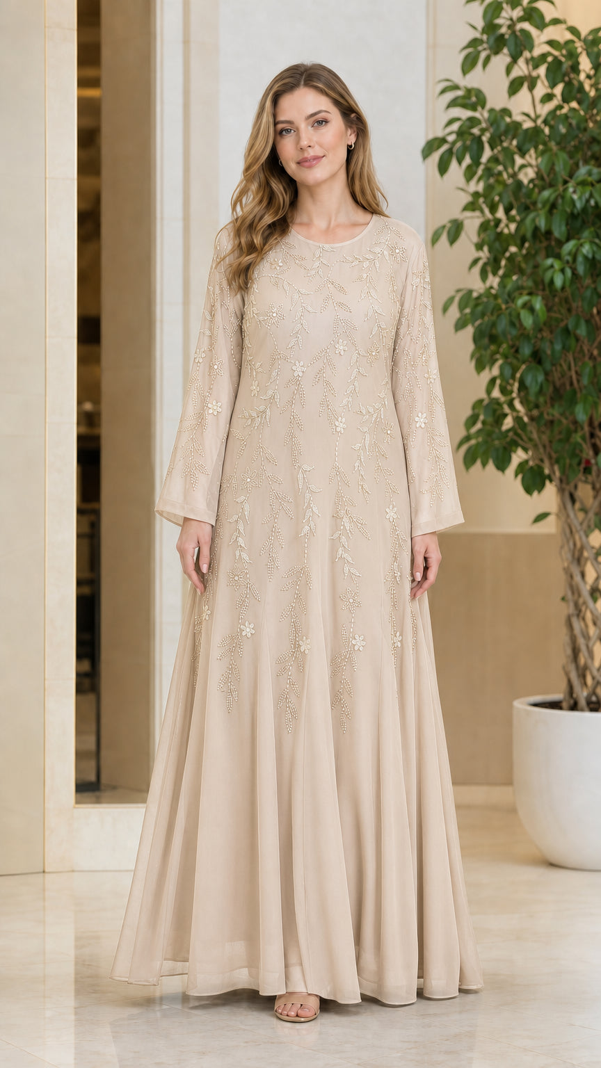 Front full-length view of model wearing the Champagne beige embellished maxi dress